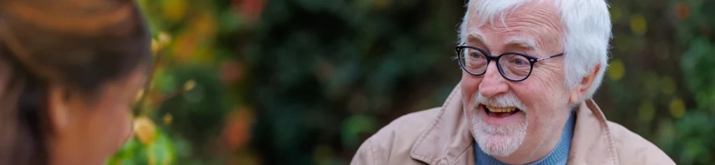 A man wearing a white jacket.