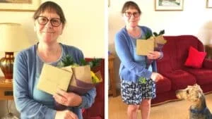 A woman wearing glasses, a blue cardigan, and a patterned skirt holds flowers and a card. In one photo, she stands smiling; in the other, she offers flowers to a dog in a sitting room with a red sofa.